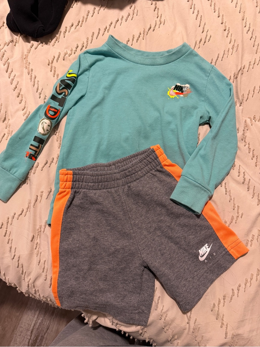 Nike Teal Long Sleeve Top with Gray Shorts and Orange Side Panels